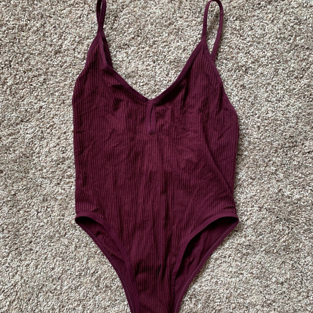 Maroon peep-hole bodysuit